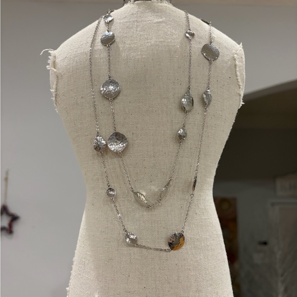 Melinda Maria Silver Tone
Hammered Disc Long Strand necklace